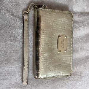 Gold Medium Sized Michael Kors wallet.